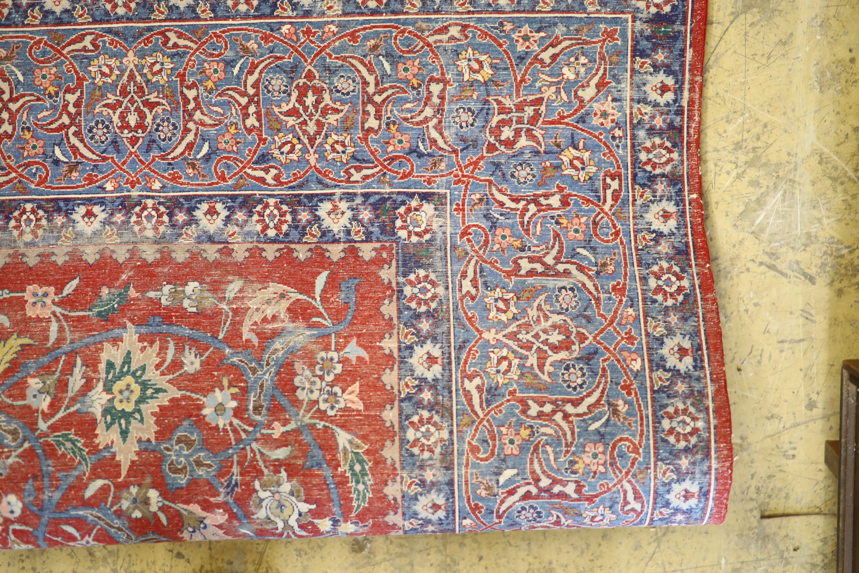 An Isfahan red ground rug, 169 x 110cm